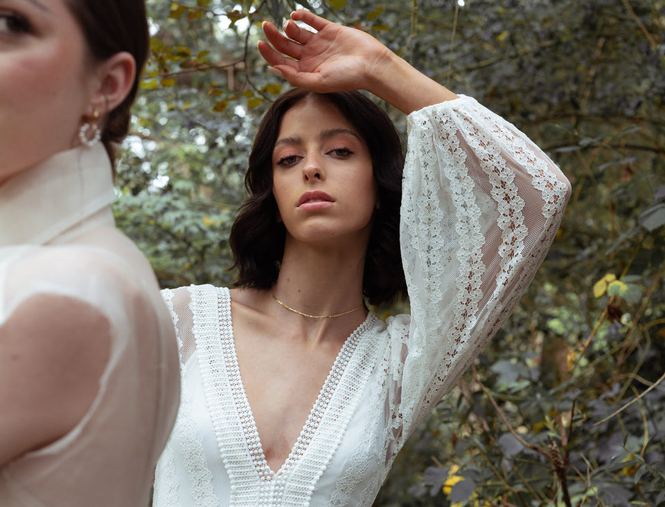 a model wearing a beautiful vintage lace dress styled by Jenna for Moss Magazine