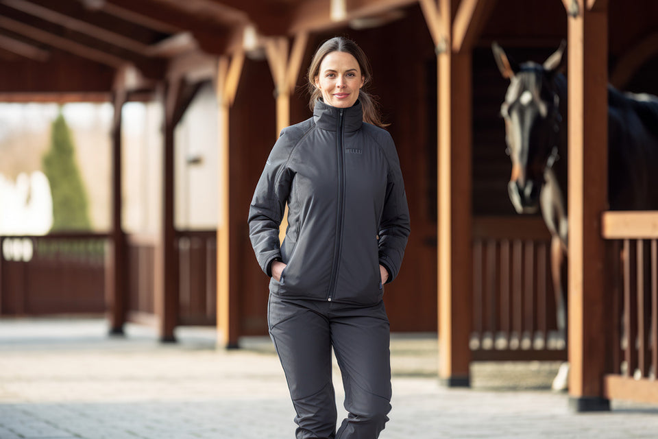 a woman wearing a gray tracksuit