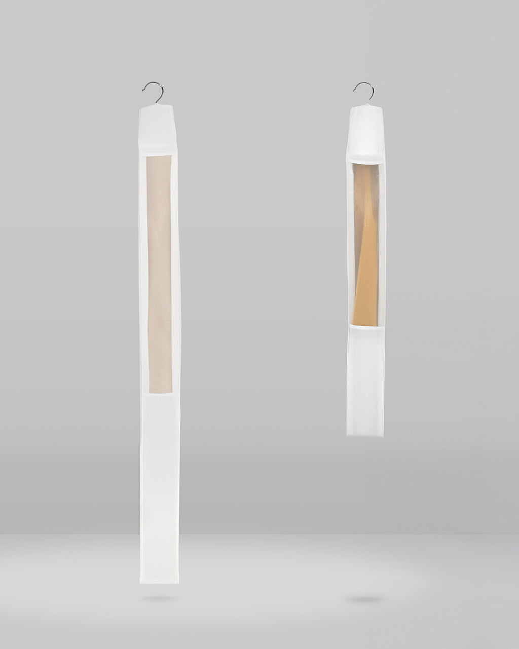 the side profile of a long and a short hanging bag showing the see through panels on both