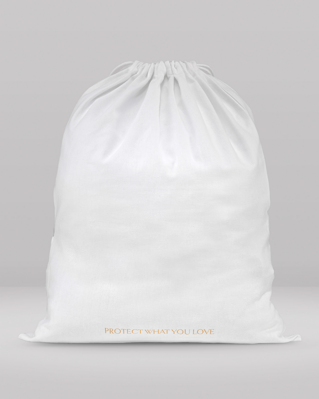the rear view of a medium dust bag showing the writing 'protect what you love'
