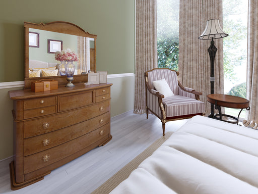 an antique dresser in a bedroom