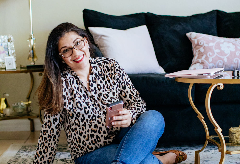 Nathalie at home in her stylish living room