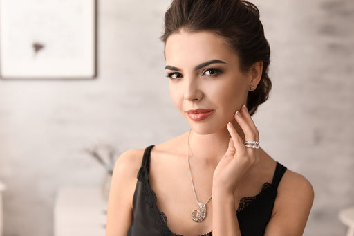 a sophisticated woman wearing beautiful diamond jewelry