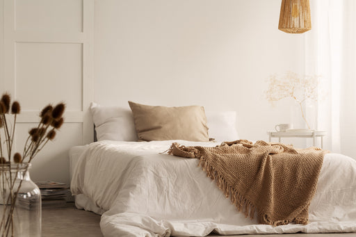 a comfortable bed using linen pillow covers and a linen duvet
