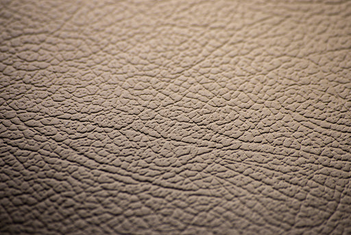 a close up of a sample of brown Nappa leather