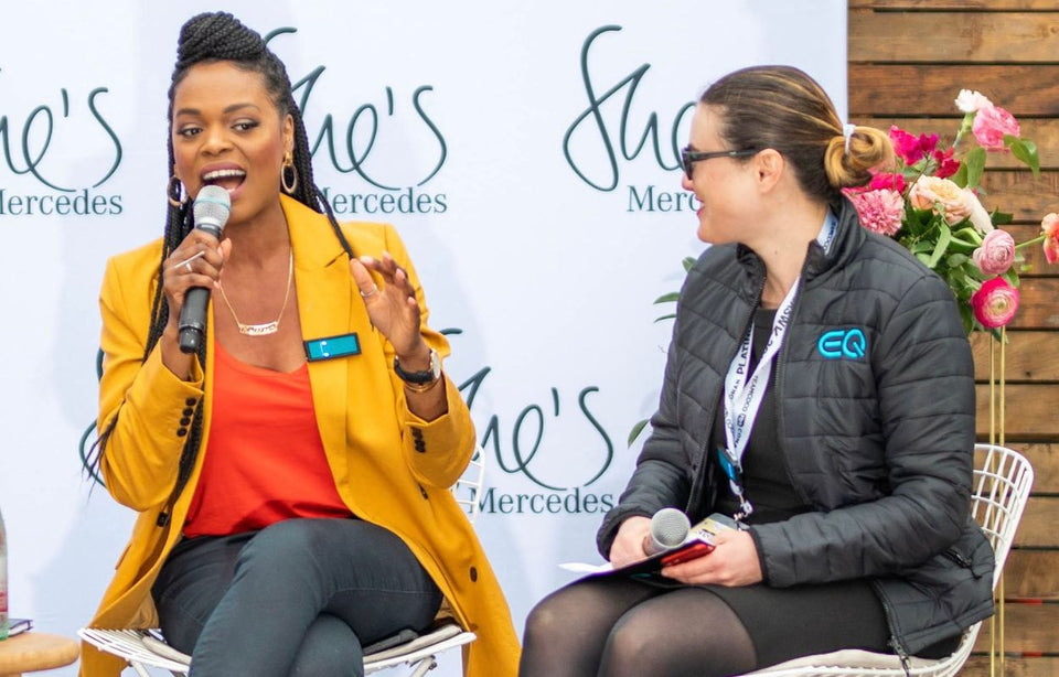 Kathleen being interviewed at a conference