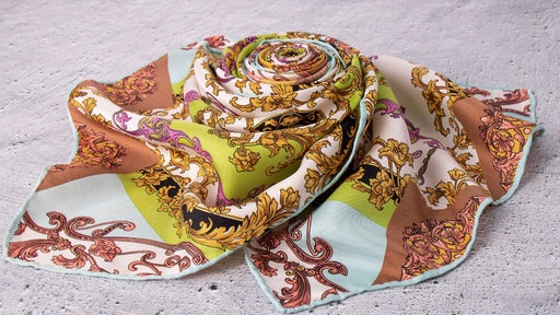 a brightly patterned silk scarf