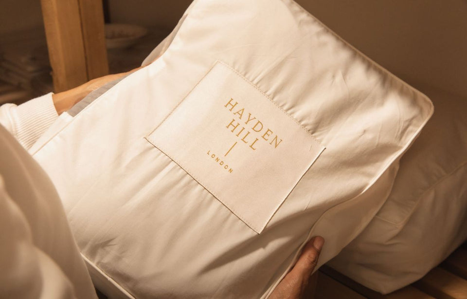 a close up of a 100% organic cotton storage bag