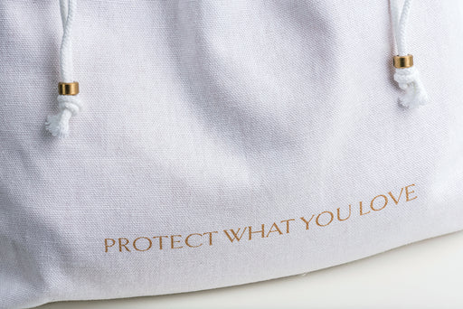 a close up of a Hayden Hill Dust Bag with their motto “Protect What You Love”