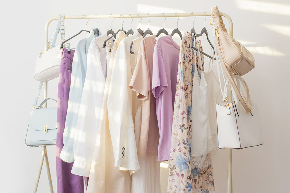 a fresh summer capsule wardrobe consisting of cream, pale blue and lilac