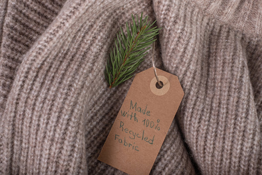 a woolen brown sweater made from recycled material