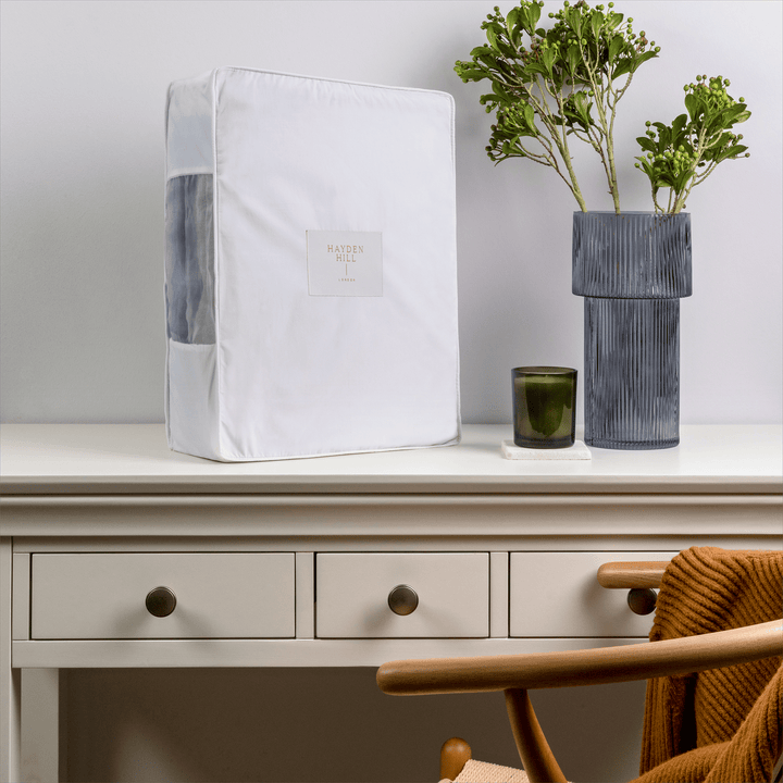 an extra large storage bag on a dressing table showing the organza panel