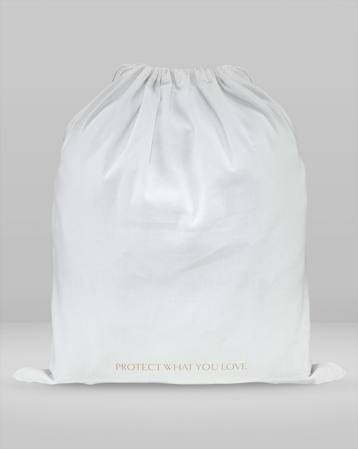 the rear view of a large dust bag showing the writing 'protect what you love'