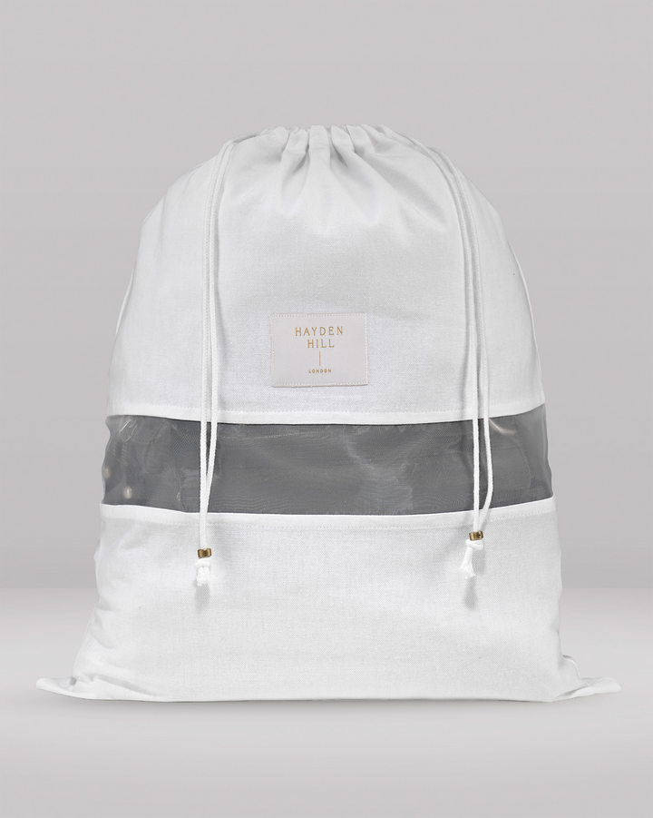 the front view of a medium dust bag showing the organza panel and drawstrings with brass sliders